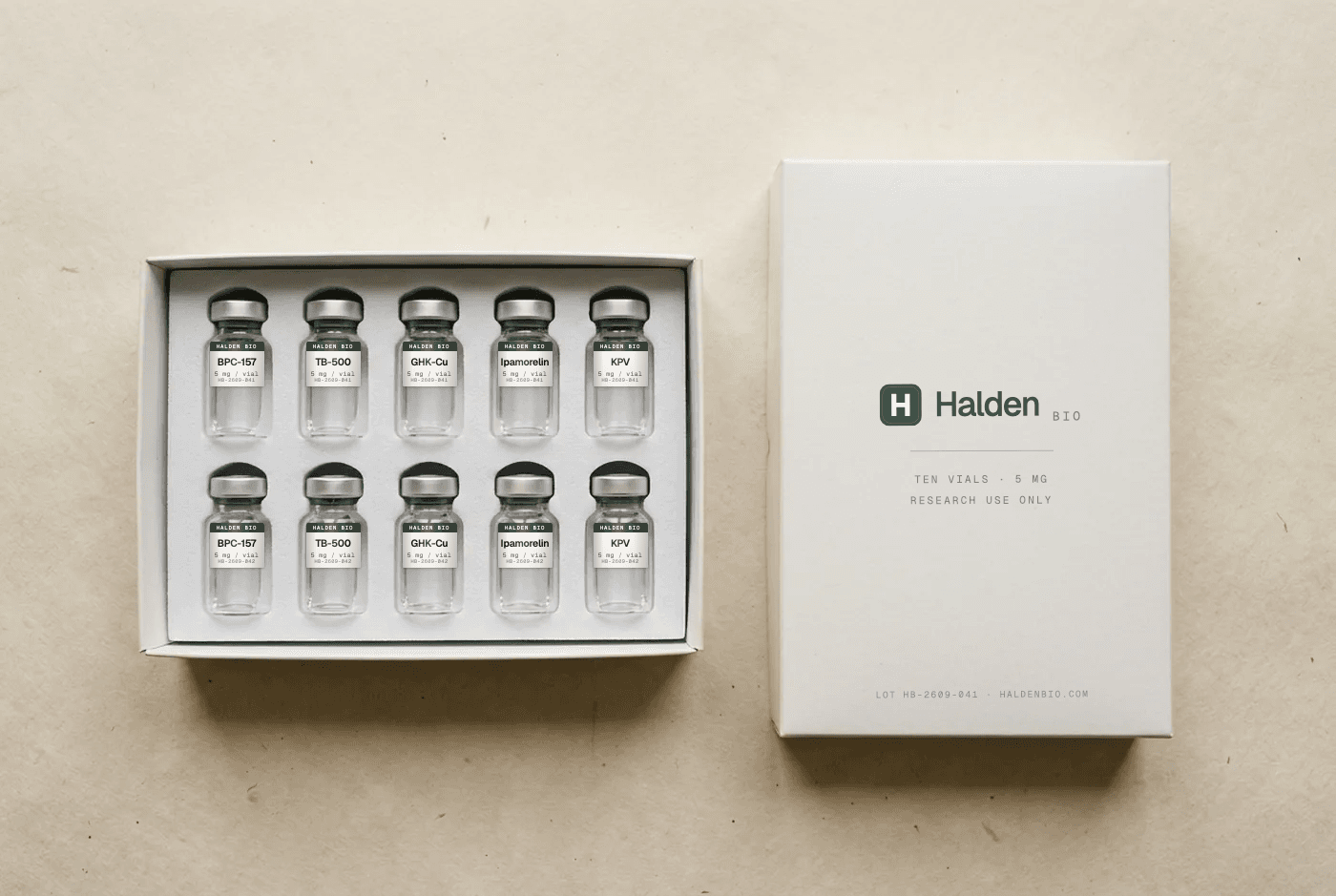 Ten labelled vials seated in a moulded tray beside a printed outer carton